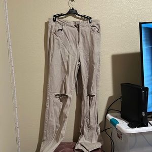 Tan oversized jeans with rips